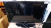 32" SAMSUNG TV -REMOTE IN OFFICE