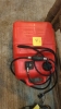 Honda outboard fuel tank with hose.