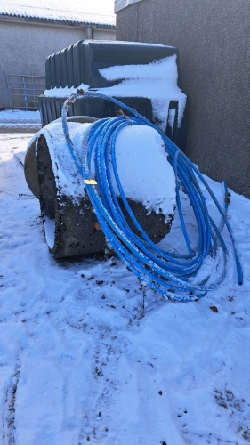 CONCRETE RING AND BLUE WATER PIPE