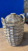 FLAGON IN BASKET