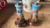 2 SILVER TOPPED VASES