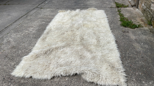 SHEEPSKIN RUG & TOY LION