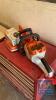 STIHL BATTERY CHAINSAW C/W BATTERY AND CHARGER